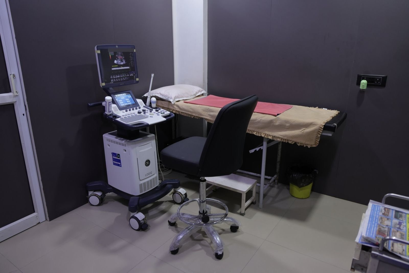 Ultrasound room with a GE LOGIQ scanner at Cosmic Women’s Hospital, Naroda